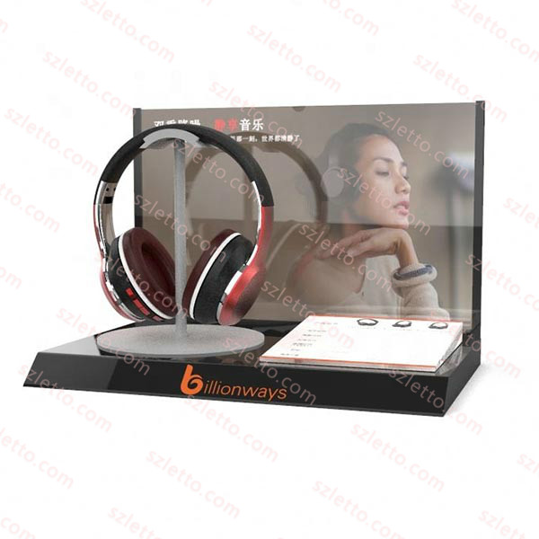 Electronic/headphone products display stand on table